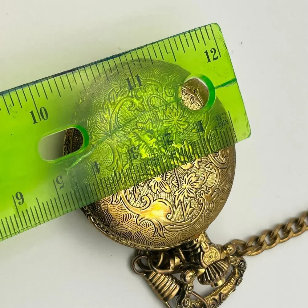 Vintage Details Gold Tone Truck Emblem Cover Pocket Quartz Watch